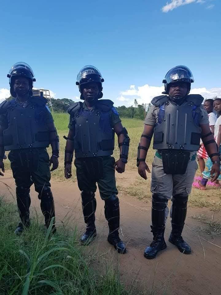 Officers in full riot protection gear during field training