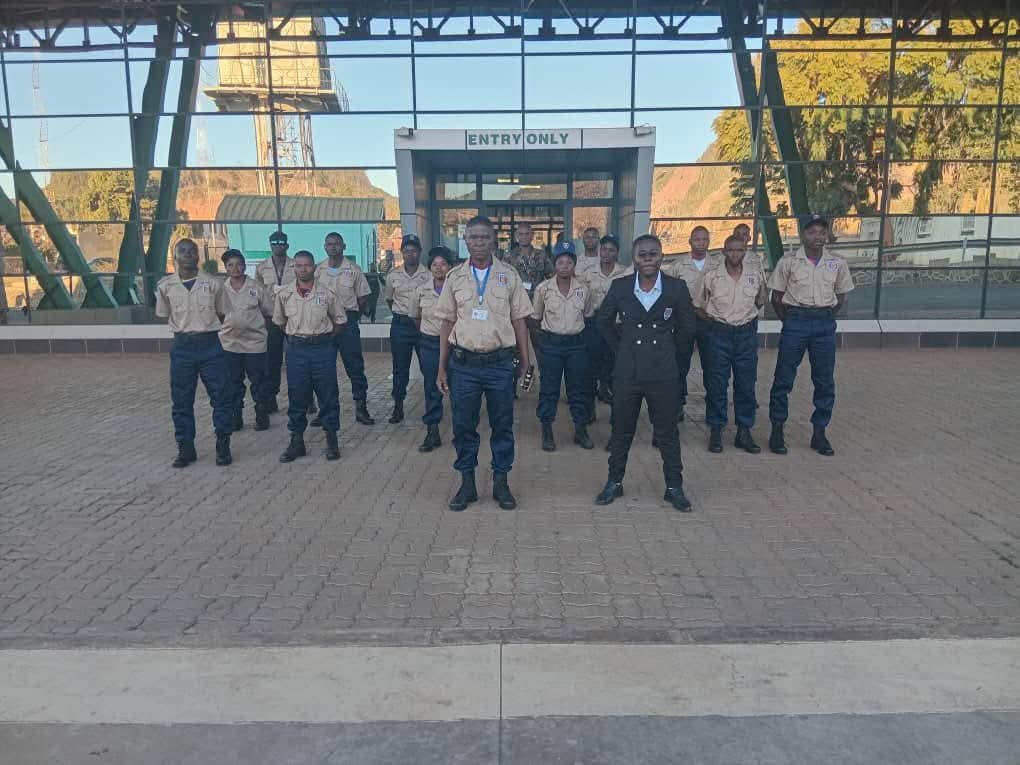 UK Security Services guard detail on parade at a client site in Blantyre